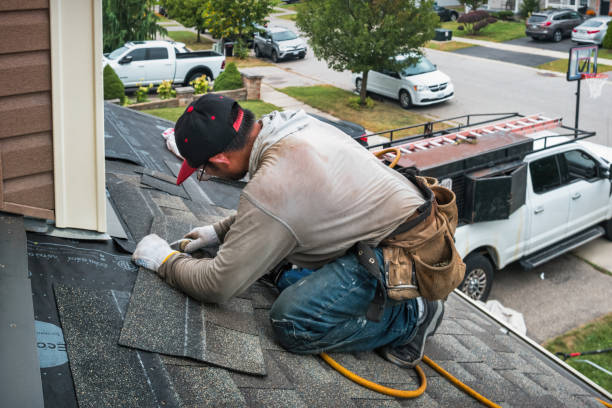 Professional Emergency Roof Repair technician working in West Hatfield, MA
